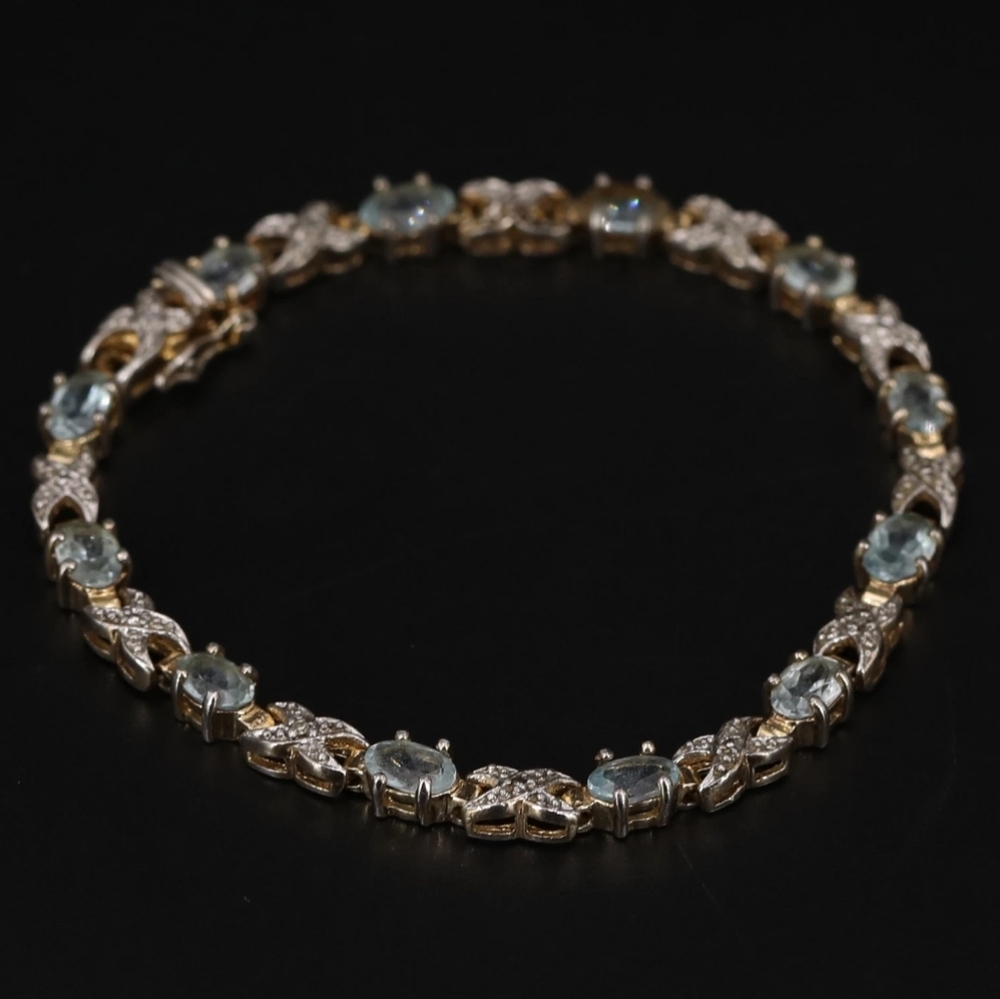 Blue Topaz & Diamond Gold Tennis Bracelet